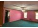 Spacious bedroom with carpet, ceiling fan and dual windows allowing for natural light at 80 White Deer Ln, Henderson, NC 27537