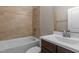 Well-maintained bathroom with tiled shower and tub combination and a clean vanity at 8840 Forester Ln, Apex, NC 27539