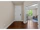 Inviting entryway with hardwood floors, and a view of the office and home beyond at 8840 Forester Ln, Apex, NC 27539