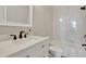 Elegant bathroom featuring marble countertops, modern fixtures, and a tiled shower-tub combination at 100 Highveld Ave, Chapel Hill, NC 27516