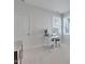 Bedroom with a standing desk and large windows that offer great natural light at 100 Highveld Ave, Chapel Hill, NC 27516