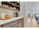 Butlers pantry featuring a wine rack, coffee bar, and access to the kitchen at 100 Highveld Ave, Chapel Hill, NC 27516