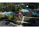 Aerial view of the community clubhouse and both community pools at 100 Highveld Ave, Chapel Hill, NC 27516