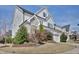 Charming two-story home with stone accents, neutral siding, well-manicured landscaping, and an attached two car garage at 100 Highveld Ave, Chapel Hill, NC 27516