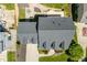 Aerial view of gray roof, patio area and landscaping of beautiful home at 10320 Crisp Dr, Raleigh, NC 27614