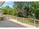 Wooden deck overlooking a green backyard at 10320 Crisp Dr, Raleigh, NC 27614