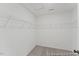 Bright closet features wire shelving for organization, and plush carpet flooring at 105 S Mule Way # 89, Benson, NC 27504