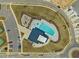 Aerial view of community pool, recreation center, playground, and surrounding parking areas at 1095 Channel Drop Lp, Zebulon, NC 27597