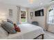 Bedroom with natural light, large windows, comfortable bedding and modern decor at 1112 Watauga Street St, Raleigh, NC 27604