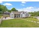 Beautifully landscaped front yard and an immaculate exterior with a welcoming front porch at 1112 Watauga Street St, Raleigh, NC 27604