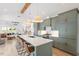 Bright kitchen with a large island, updated appliances, and stylish pendant lighting at 1112 Watauga Street St, Raleigh, NC 27604