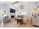 Bright living room with vaulted ceilings, a fireplace, and stylish decor at 1112 Watauga Street St, Raleigh, NC 27604