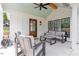 Covered outdoor patio features comfortable seating and stylish decor at 1112 Watauga Street St, Raleigh, NC 27604