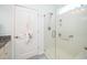Bathroom with tile floors, a glass door shower and granite countertops at 112 Manning Way, Durham, NC 27703
