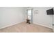 Empty room with neutral walls, carpeted floors, and a window with natural light at 112 Manning Way, Durham, NC 27703