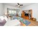 Comfortable living space with a ceiling fan, plush seating, and a built-in entertainment center, ideal for relaxation at 112 Manning Way, Durham, NC 27703