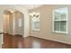 Bright dining area with hardwood floors and a window with natural light at 1175 Contessa Dr, Cary, NC 27513