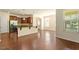 Bright open kitchen features stainless appliances and a convenient breakfast bar for casual dining at 1175 Contessa Dr, Cary, NC 27513