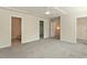 Main bedroom featuring a decorative ceiling, plush carpet, and multiple entrances at 1175 Contessa Dr, Cary, NC 27513