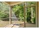 Enclosed screened porch overlooking a wooded area at 1175 Contessa Dr, Cary, NC 27513