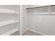 A bright closet featuring built-in shelving for optimal storage at 124 Landon Pl, Roxboro, NC 27573