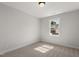 Cozy bedroom with carpeted floors and a window offering natural light at 1306 Cricket St, Elon, NC 27244