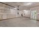 Spacious garage with unfinished walls leading to the interior at 1306 Cricket St, Elon, NC 27244
