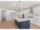 Gorgeous kitchen featuring a center island and stainless steel appliances at 1306 Cricket St, Elon, NC 27244