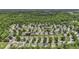 Well-manicured neighborhood with mature trees and sidewalks throughout the community at 133 Pasadena Rd, Garner, NC 27529