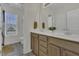Bright bathroom with a double vanity sink and ample storage space at 133 Pasadena Rd, Garner, NC 27529