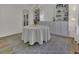 Bright dining room with natural light and a table set for an elegant meal at 133 Pasadena Rd, Garner, NC 27529