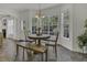 Eat-in kitchen with large windows, pendant lighting, and wooden table with bench at 133 Pasadena Rd, Garner, NC 27529