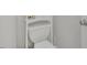 Toilet and white storage shelving at 133 Pasadena Rd, Garner, NC 27529