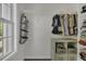 Walk-in closet featuring ample storage with a window providing natural light at 133 Pasadena Rd, Garner, NC 27529