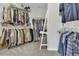Large walk-in closet with ample shelving and hanging space for organized storage at 133 Pasadena Rd, Garner, NC 27529