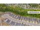Aerial view showcases property lines, surrounding homes, and tree coverage at 138 Yellow Jacket Rdg, Clayton, NC 27520