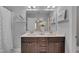 Bathroom with a double vanity, large mirror, and elegant fixtures, creating a relaxing ambiance at 138 Yellow Jacket Rdg, Clayton, NC 27520