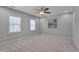 Bright and airy bedroom with two windows and plush carpet, offering comfort at 138 Yellow Jacket Rdg, Clayton, NC 27520