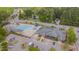 Aerial view of a community pool featuring slides, a pool, and lounging areas at 138 Yellow Jacket Rdg, Clayton, NC 27520