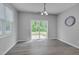 Cozy dining area with natural light, sliding glass door, and light fixtures at 138 Yellow Jacket Rdg, Clayton, NC 27520