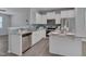 Modern kitchen boasts white cabinets, granite countertops, and stainless steel appliances perfect for cooking at 138 Yellow Jacket Rdg, Clayton, NC 27520