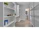 Bright storage area with open shelving and hardwood floors, perfect for organization at 138 Yellow Jacket Rdg, Clayton, NC 27520