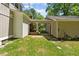 Spacious backyard featuring a covered walkway connecting to a garage at 1414 Walter Bright Rd, Sanford, NC 27330