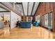 Bright living room with hardwood floors, vaulted ceiling and exposed beams at 1414 Walter Bright Rd, Sanford, NC 27330