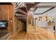 Unique wooden spiral staircase, connecting living spaces, and flooded with natural light at 1414 Walter Bright Rd, Sanford, NC 27330
