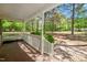Enjoy the scenery from this covered back porch with treed view at 145 Mark St, Franklinton, NC 27525