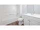 Bright bathroom features a shower-tub combo and modern vanity at 145 Mark St, Franklinton, NC 27525