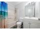 Well-lit bathroom with shower and vanity featuring modern fixtures at 145 Mark St, Franklinton, NC 27525
