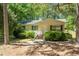 Charming single-story home with a cozy front porch and well-maintained landscaping at 145 Mark St, Franklinton, NC 27525
