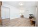 Bright living room with wood-look flooring and ample space for furniture at 145 Mark St, Franklinton, NC 27525